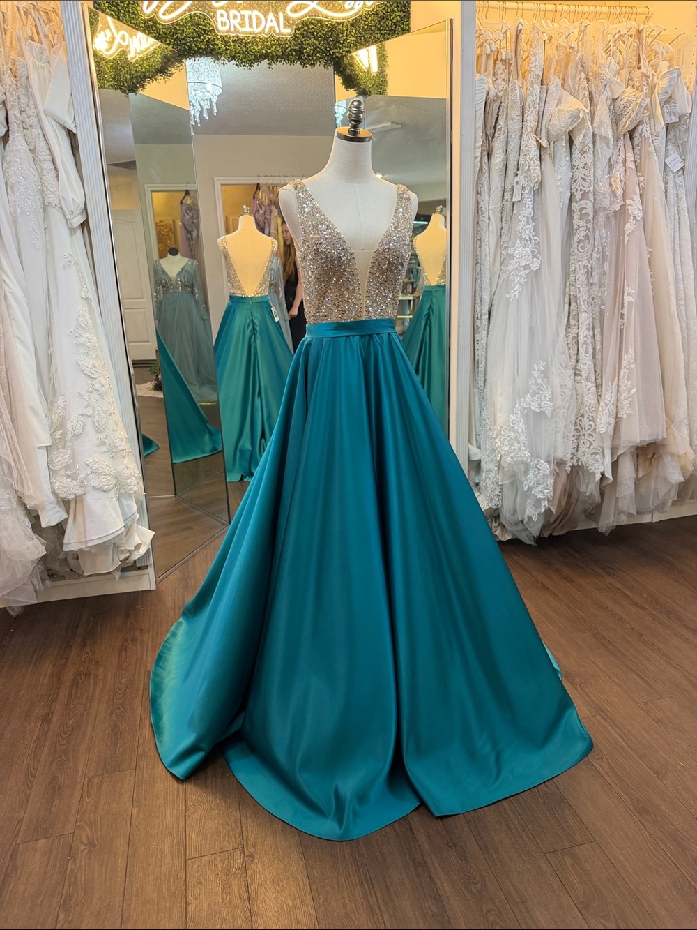 Elegant Teal Satin Ball Gown with Sequin Bodice